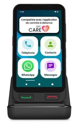 the phone is connected to a charging dock with a message on the screen