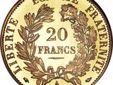 a close up of a coin with a wreath on it