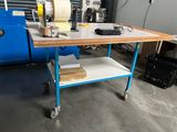 an image of a table with a sewing machine on it