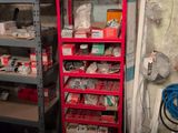 a red shelf with lots of items on it in a room