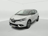 a white car in a white room with a white floor