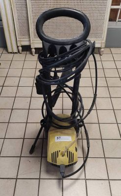 a machine that is sitting on a tiled floor