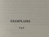 a close up of a book with the title exemplaire on it