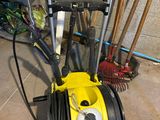 a picture of a yellow and black pressurer and a broom