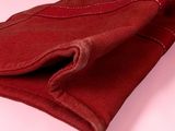 the red cloth is folded on top of the red cloth
