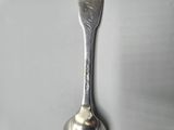 a spoon that is sitting on a table