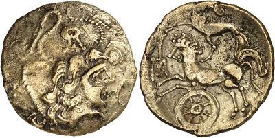 a silver coin with an image of a man on a horse