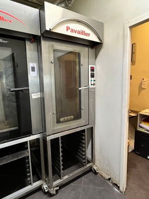 two ovens that are sitting in a room