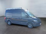 a blue van that is parked in a room