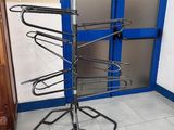 a picture of a rack of clothes in a room
