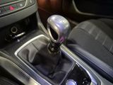 an image of a car ' s gear lever in the center console