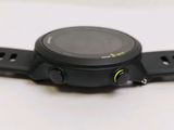a close up of a smart watch on a white surface