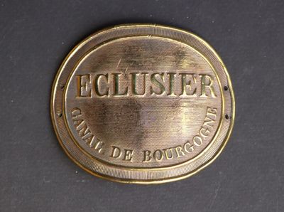 an image of a gold coin with the name of a company on it