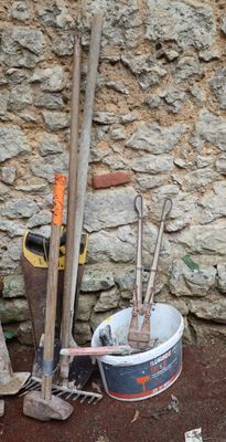 a lot of tools that are sitting on the ground