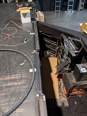 a large black table with a lot of electronics on it