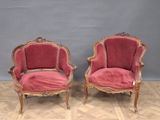 pair of antique french style chairs with pink velvet upholstered seats
