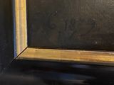 an image of a painting of a black and gold frame on a black wall