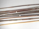 a lot of sticks that are sitting on a table