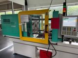 a machine that is sitting in a room with windows