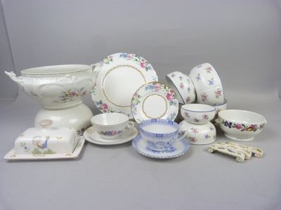 many different types of china on display on the table