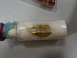 a bottle of cream sitting on top of a counter