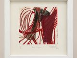 an image of a picture of a red and black painting in a white frame