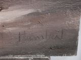 a piece of wood that has writing on it