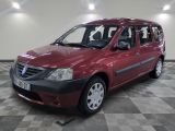 a picture of a red car parked in a garage