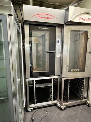 two ovens that are sitting in a room