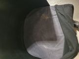 a black bag that is sitting on a table