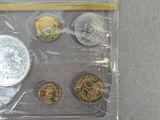 some coins are in a plastic bag on a table