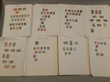 many different types of stamps on the pages of a book