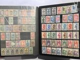a book with a lot of stamps inside of it