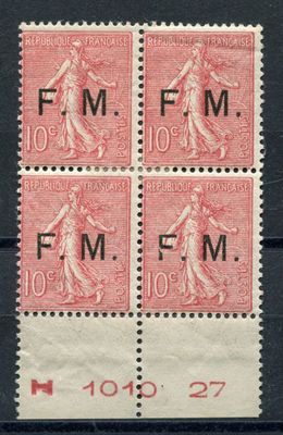 a stamp with four different images of a woman on it