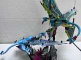 a toy dragon that is sitting on top of a table