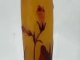 an image of a vase with a flower on it
