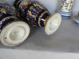 three vases that are sitting on a table