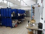 many bins in a room with a lot of boxes