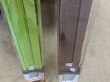 two green umbrellas that are on display in a store