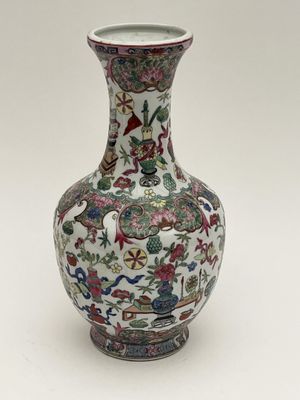 an image of a vase with flowers and birds painted on it
