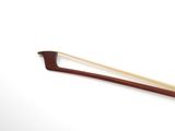 wooden chopsticks on a white surface with a white background