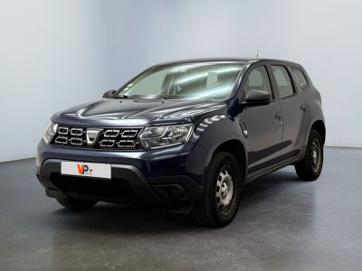 a picture of a blue pick up truck parked in a showroom