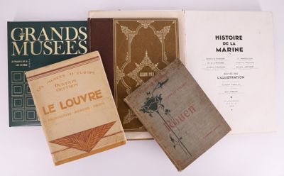 trois livres sont empilés sur une surface blanche