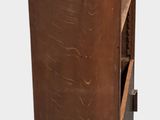 a tall wooden cabinet with a drawer on it