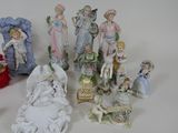 many figurines that are sitting on a table