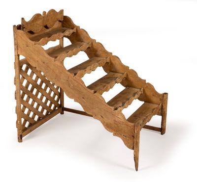 an image of a wooden wine rack on a white background