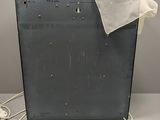 a metal box with a white cloth on top of it