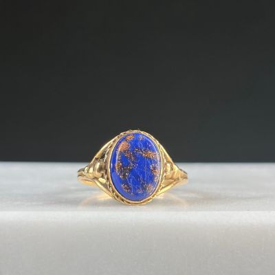 Bague en or jaune 750/1000 (18K) ornée de résine imitant une…