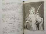 an open book with a drawing of a woman holding a sword