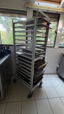 an image of a commercial kitchen with a rack of trays